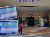 An image of a man holding a Thai drivers license outside the Department of Land Transport Bangkok.