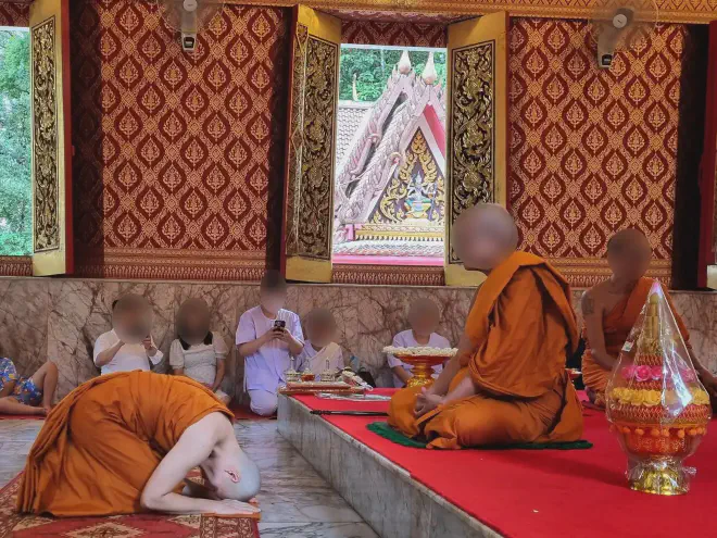 “The new monk bows”